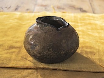 Dark raku round ceramic vase designed by Marina OAZ houseware