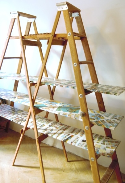 Bookshelf made with ladders and comics